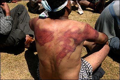 Iraqi prisoner beaten and whipped by Iraqi guards that replaced Americans.
